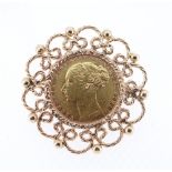 VICTORIAN GOLD SOVEREIGN BROOCH, 1884 (young head), in 9ct gold scroll and ball mount, 14.3gms