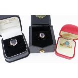 THREE BOXED GOLD RINGS comprising 18ct gold sapphire & diamond cluster ring, 9k gold cluster dress
