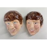TWO KELSBORO WARE BEATLES WALL MASKS, c. 1960, of George Harrison (no. 2) and Ringo Star (no. 1),