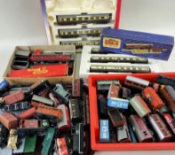 LARGE ASSORTMENT 00 GAUGE ROLLING STOCK, by Lima, Hornby Wrenn, Tri-ang, and including a boxed