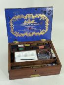 WINDSOR & NEWTON MAHOGANY ARTIST'S PAINT BOX, 19th century, hinged cover with gilt printed label,