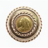 VICTORIAN GOLD HALF SOVEREIGN BROOCH, 1897 (old head), in 9ct gold circular mount, 9.5gms