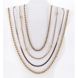 ASSORTED YELLOW METAL NECKLACES comprising three 9ct gold necklaces, 32.1gms gross, together with