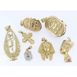 ASSORTED YELLOW METAL JEWELLERY comprising seven pendants of varying design including three