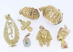 ASSORTED YELLOW METAL JEWELLERY comprising seven pendants of varying design including three