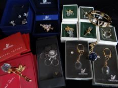 ASSORTED SWAROVSKI CRYSTAL JEWELLERY, including Crystal Memories brooches and pendants, Xmas tree