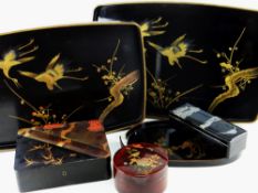 SIX JAPANESE LACQUER ITEMS, including three trays and three boxes, variously decorated with tsuru,