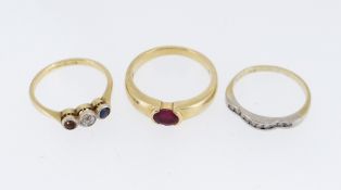THREE GOLD GEM SET RINGS comprising 14ct gold diamond chip ring, 18ct gold and platinum diamond