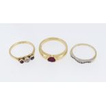 THREE GOLD GEM SET RINGS comprising 14ct gold diamond chip ring, 18ct gold and platinum diamond