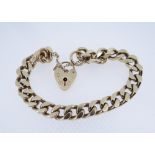 9CT GOLD HEAVY FLAT LINK BRACELET, having heart shaped padlock, 31.4gms Provenance: deceased