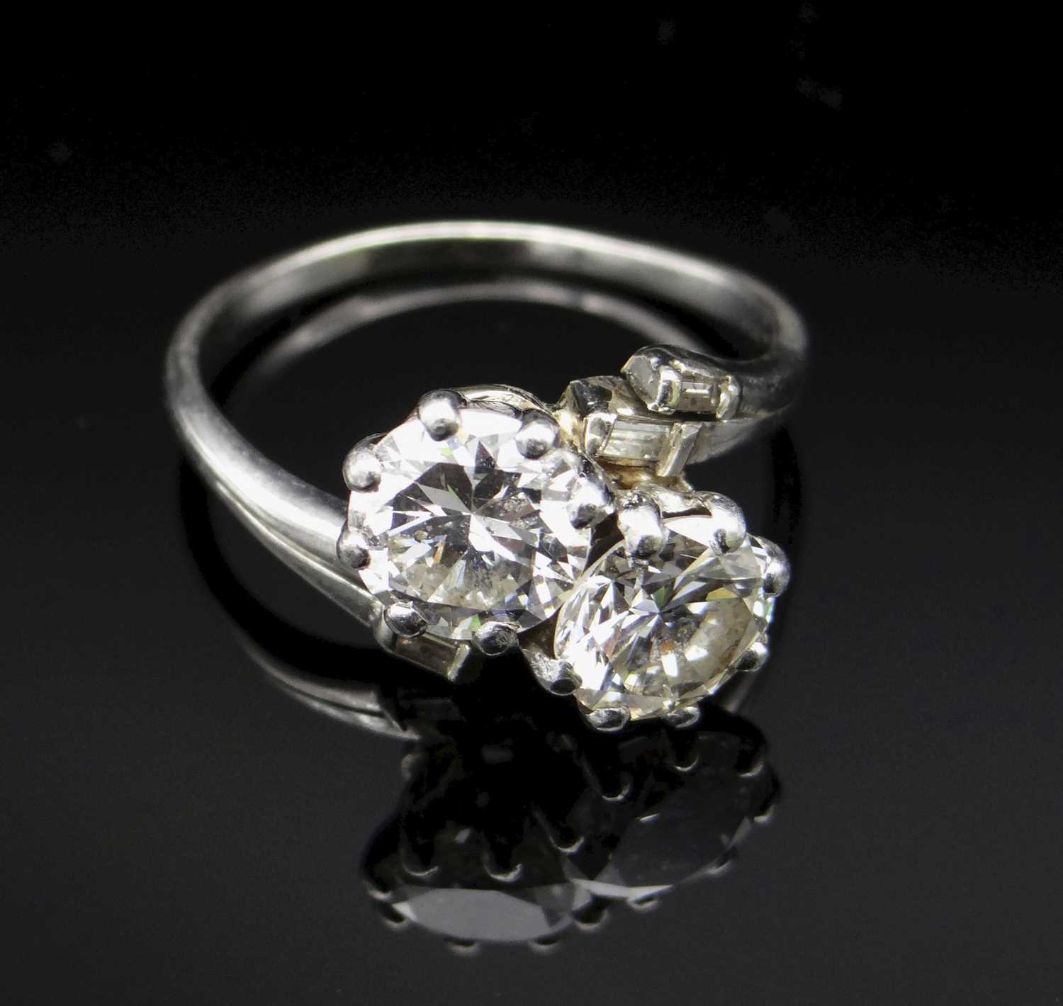 TWO STONE DIAMOND CROSSOVER RING