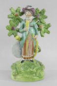 STAFFORDSHIRE PEARLWARE FIGURE OF A LADY ARCHER c. 1820
