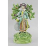 STAFFORDSHIRE PEARLWARE FIGURE OF A LADY ARCHER c. 1820