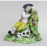 STAFFORDSHIRE PEARLWARE FIGURE OF SLEEPING BOY c. 1820