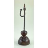 18TH CENTURY IRON TABLE RUSH NIP, twisted wrought iron stem and turned elm base, 32.5cms Comments: