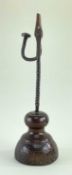 18TH CENTURY IRON TABLE RUSH NIP, twisted wrought iron stem and turned elm base, 32.5cms Comments: