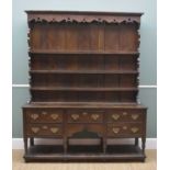 18TH CENTURY WELSH OAK DRESSER, probably Montgomeryshire, pierced frieze and shaped sides to the