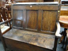 WELSH 18TH CENTURY JOINED OAK BOX SETTLE, triple panelled back, slightly bowed arms with rounded