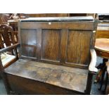 WELSH 18TH CENTURY JOINED OAK BOX SETTLE, triple panelled back, slightly bowed arms with rounded