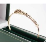 9CT GOLD BANGLE WITH HORSEHEAD CLASP, 16.3grms