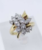 18CT GOLD DIAMOND CLUSTER RING, the twist shank set with fifteen graduated round brilliant diamonds,