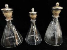 HARRY POWELL FOR JAMES POWELL & SONS, WHITEFRIARS, three 'Leather Bottle' clear glass conical