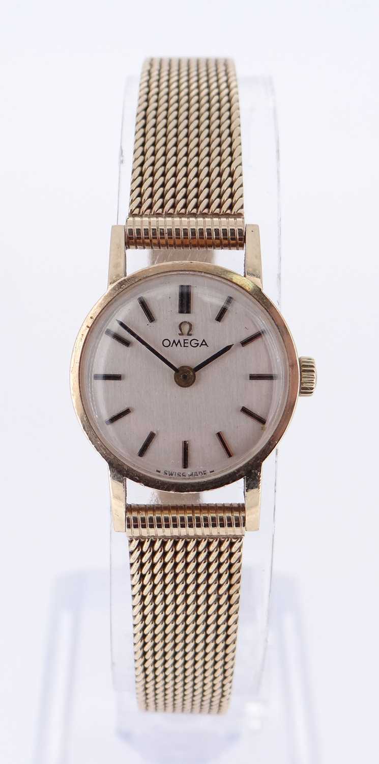 OMEGA LADIES 9CT GOLD WRISTWATCH, the circular dial with baton markers, numbered to inner back cover