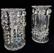 TWO 19TH CENTURY CUT GLASS LUSTRES, faceted stems, one with petal rim, both hung with cut glass