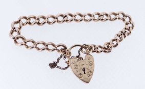 9CT GOLD CURB LINK BRACELET, having engraved heart shaped padlock, 17.3gms Provenance: deceased