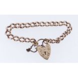 9CT GOLD CURB LINK BRACELET, having engraved heart shaped padlock, 17.3gms Provenance: deceased