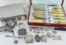 ASSORTED SILVER COLLECTIBLES, including ringstand, cigarette box with presentation inscription dated