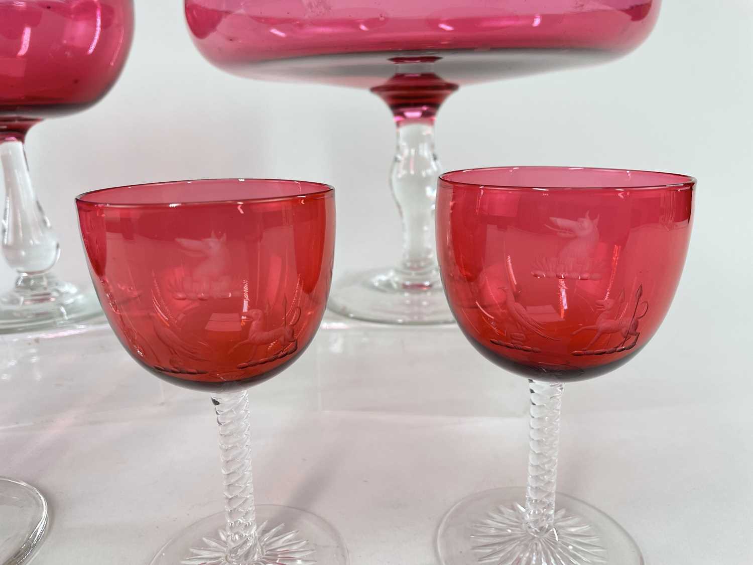 FIVE EDWARDIAN CRANBERRY GLASS STEMMED VESSELS, including pair wine goblets finely engraved with - Image 2 of 2