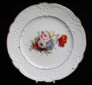 NANTGARW PORCELAIN PLATE, c.1818-1820, having a typical moulded floral border with c-scrolls and