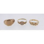 TWO 18CT GOLD GEM SET RINGS and a 9ct gold signet ring (worn / cut)
