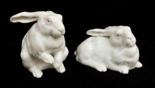 TWO SIMILAR FUKAGAWA PORCELAIN HARES, one seated the other recumbent, impressed marks to bases (2)