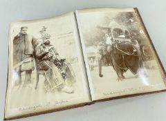 INTERESTING VICTORIAN LEATHER PHOTOGRAPH ALBUM, c. late 1870s to early 1880s, mainly small format