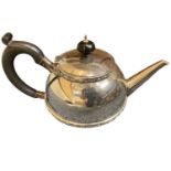 SILVER TEAPOT - Birmingham 1945, 11.9ozt with ebonised handle and lid finial, 24cms across