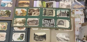 VINTAGE POSTCARD & CIGARETTE CARD COLLECTION - in four albums and loose, approximately 700 postcards