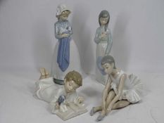 NAO PORCELAIN FIGURINES (4) including a bonneted standing girl holding a puppy, 25cms H, a pensive