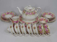 ROYAL ALBERT 'SERENA' TEASET, twenty three pieces to include teapot and cover, seven cups, six