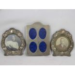 THREE HALLMARKED SILVER PHOTOGRAPH FRAMES to include a pair of shaped examples, embossed with