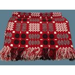 TRADITIONAL WELSH WOOLLEN BLANKET - with tasselled ends, multicoloured ground red with label '