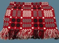 TRADITIONAL WELSH WOOLLEN BLANKET - with tasselled ends, multicoloured ground red with label '