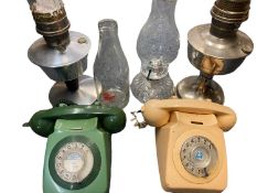 TWO CIRCULAR DIAL TELEPHONES, three oil lamps with funnels and an over-sized milk bottle marked '