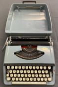 BROTHER PORTABLE TYPEWRITER - in hard blue case