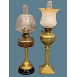 OIL LAMPS (2) - both with stepped bases, one circular and one square with reeded columns.  Square