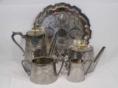VICTORIAN BRIGHT CUT FOUR PIECE PLATED TEASET on a later circular tray