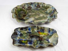 STUDIO POTTERY NUT DISHES (2) both having fluted edges in multi-coloured glazes and applied leafage,