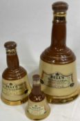 WADE POTTERY BELLS SCOTCH WHISKY CONTAINERS & SEALED CONTENTS (3) - graduated sizes 25cms H the