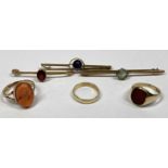 9CT GOLD RINGS & BAR BROOCHES - three of each to include a small wedding band size Mid M-N, carved